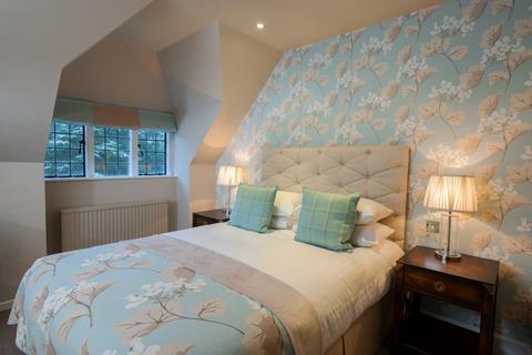 Laura Ashley The Manor is located in Elstree, Hertfordshire and comprises 49 individually designed rooms